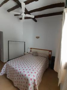Cama o camas de una habitación en Can Beia Rural House Ibiza