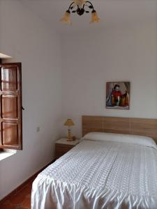 Postel nebo postele na pokoji v ubytování Cortijo Jayon + 6 fotografií