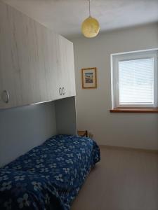 Postel nebo postele na pokoji v ubytování feltrino