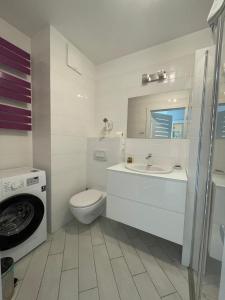 Ένα μπάνιο στο Lady - Victoria Residence by OneApartments