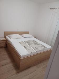 Postel nebo postele na pokoji v ubytování Apartments Beg