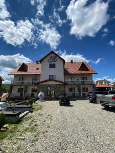 a building with graffiti on the side of it at Whiteberry Studio in Bukovel