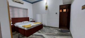 Ein Bett oder Betten in einem Zimmer der Unterkunft Jinan palace guest house Jinan palace guest house