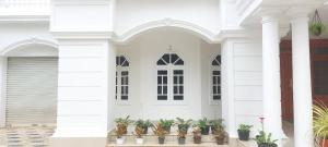 Eine Fassade oder ein Eingang zu Jinan palace guest house Jinan palace guest house