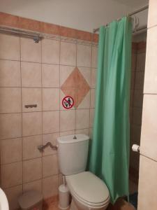 Koupelna v ubytování Cozy apartment + 5 fotografií
