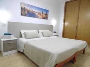Posteľ alebo postele v izbe v ubytovaní Apartamento Garland Agaete Parque