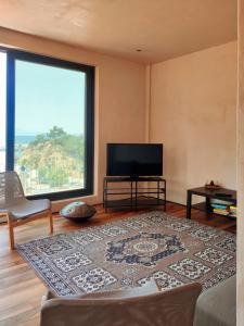 A television and/or entertainment centre at Lux Apartment