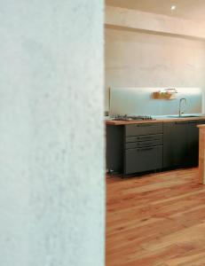A kitchen or kitchenette at Lux Apartment