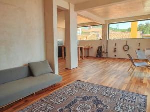 A seating area at Lux Apartment