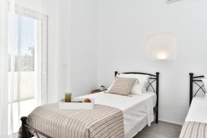 Ліжко або ліжка в номері Villa Despina
