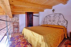 A bed or beds in a room at Masseria Bianca Még 31 kép