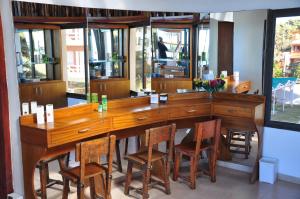 Un restaurant u otro lugar para comer en Complejo Turístico CapArcona