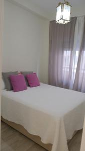 Posteľ alebo postele v izbe v ubytovaní Apartamento Marbella playa