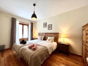 Posteľ alebo postele v izbe v ubytovaní Apartament Deluxe Espot - L'Amfitriona