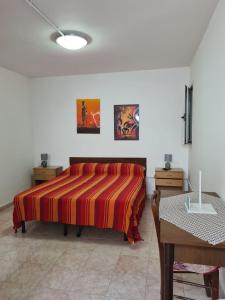 Postel nebo postele na pokoji v ubytování casa al mare kalispera