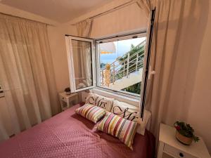 Postel nebo postele na pokoji v ubytování Villa Seknič