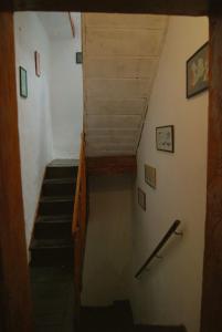 a staircase in a house with a stair case at Hostel Ka Doma in Cetinje