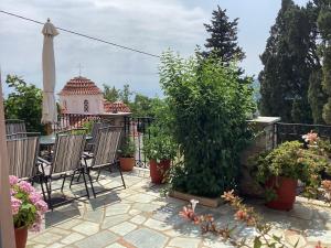 Vrt pred nastanitvijo Aegean House