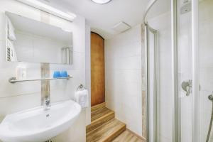 Koupelna v ubytování Hotel Garni Nuss