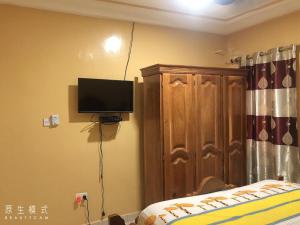 AwaMuuLamin MANNEH GUEST HOUSE客房内的一张或多张床位