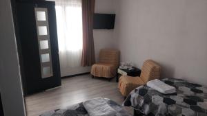 Postel nebo postele na pokoji v ubytování Casa Dexter