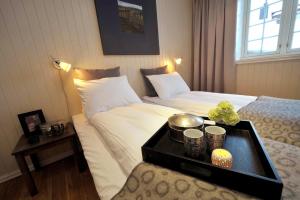 En eller flere senge i et værelse på Havsdalsgrenda Geilo Apartments