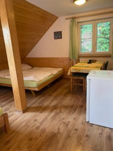 Postel nebo postele na pokoji v ubytování Alba Apartmany Železná Ruda