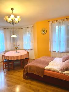 Postel nebo postele na pokoji v ubytování Alba Apartmany Železná Ruda