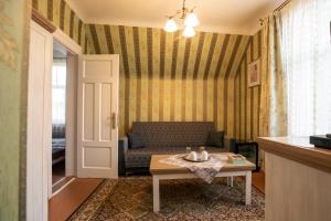 Posezení v ubytování City Center Kaķis B&B