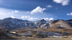 a view of a mountain range with snow covered mountains at Departamento Valle Las Leñas in Las Lenas +6 photos