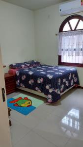 Posteľ alebo postele v izbe v ubytovaní Hostel pé da serra