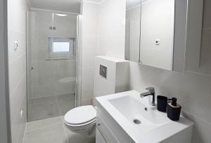 Koupelna v ubytování Apartment D & Studio L