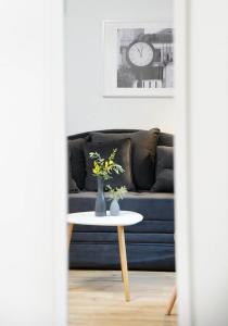 Posezení v ubytování Apartment D & Studio L