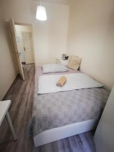 Posteľ alebo postele v izbe v ubytovaní Malasits Art Home