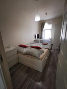 Posteľ alebo postele v izbe v ubytovaní Malasits Art Home