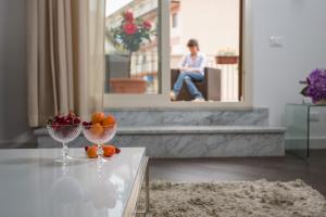 Hostia v ubytovaní Palazzo Ducale Suites