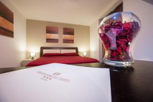 Posteľ alebo postele v izbe v ubytovaní Palazzo Ducale Suites