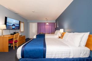 Postel nebo postele na pokoji v ubytování Ocean Crest Motel