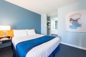 Postel nebo postele na pokoji v ubytování Ocean Crest Motel