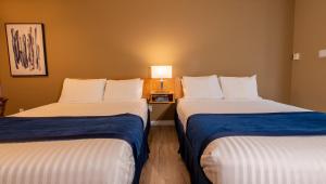 Postel nebo postele na pokoji v ubytování Ocean Crest Motel