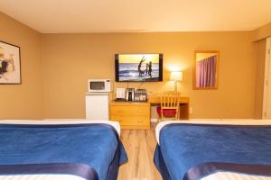 Postel nebo postele na pokoji v ubytování Ocean Crest Motel