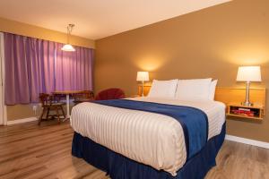 Postel nebo postele na pokoji v ubytování Ocean Crest Motel