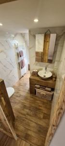 a bathroom with a sink and a mirror at Apartments Nähe Red Bull Ring in Proleb