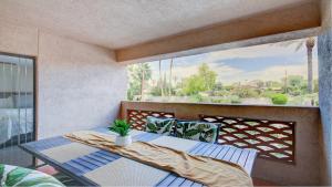 a balcony with a bed and a window at Excellent location,Relax in the heart of the City!! by Kivoya in Phoenix