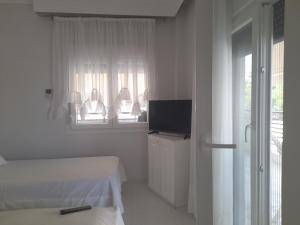 A television and/or entertainment centre at Annas seaside apartment
