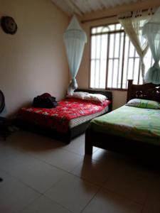 Postel nebo postele na pokoji v ubytování Casa de descanso - Finca Los Primos