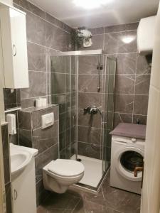 Koupelna v ubytování Apartments Tomisa