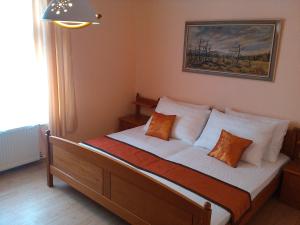 Letto o letti in una camera di Pension VIDHOUS 1