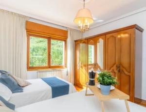 Postel nebo postele na pokoji v ubytování Casa San Esteban