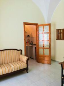 A seating area at L 'Alcova Holidays Home CENTRO STORICO